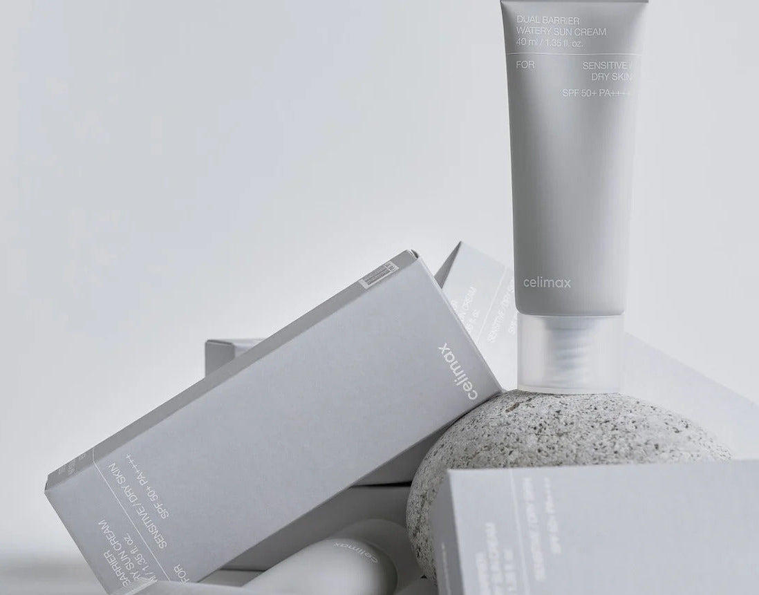 celimax sunscreen including a tube and boxes on a light gray background